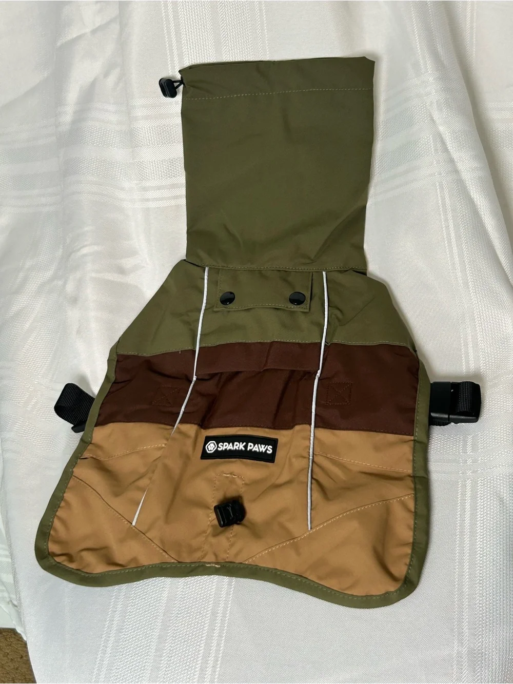 Dog clothes medium sized. Raincoat, water and wind proof, reflective detailing.